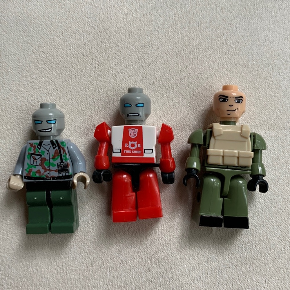 Set of 3 Lego men with moveable arms. Army guy, army medical & fire chief.